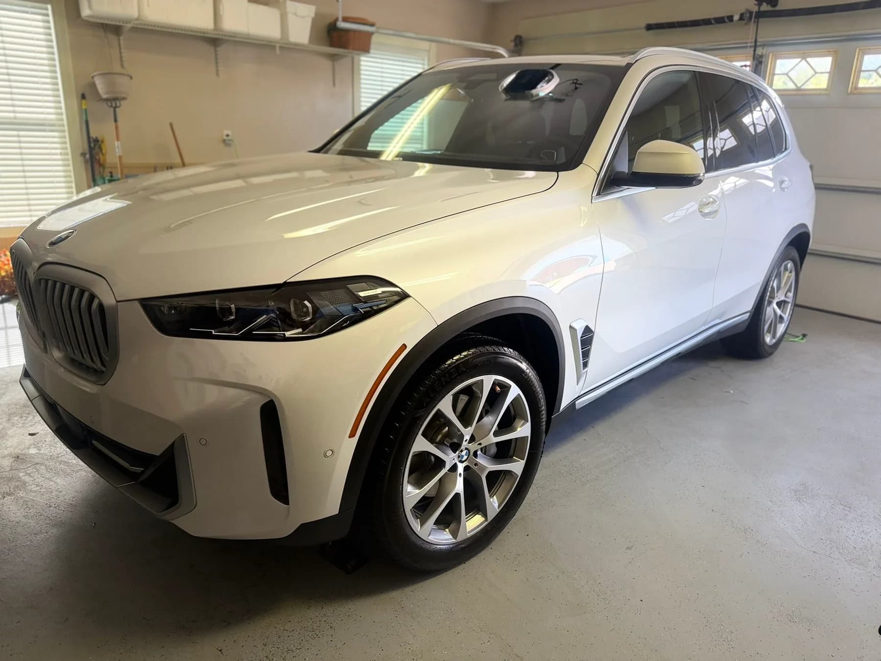White BMW SUV after detailing