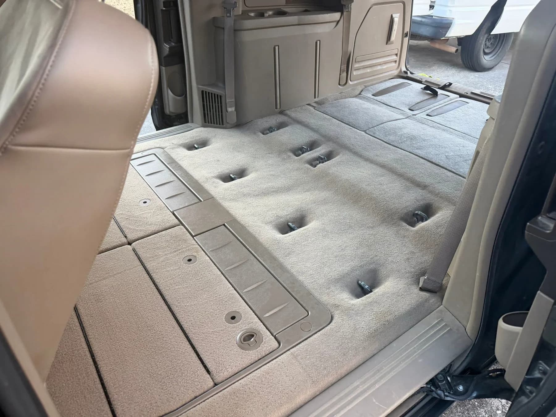 Clean vehicle carpet and rear interior