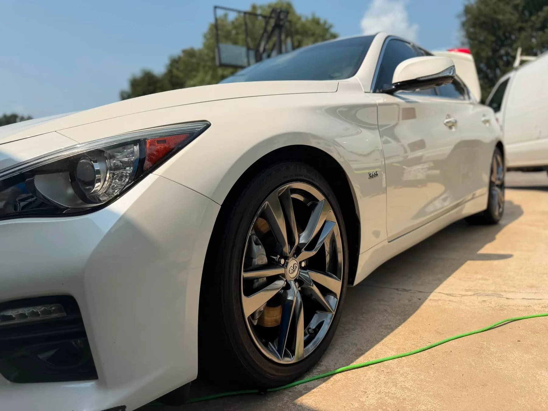Clean white coupe outside